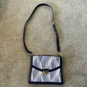 NWT.  Vera Bradley Crossbody purse with genuine leather trim.